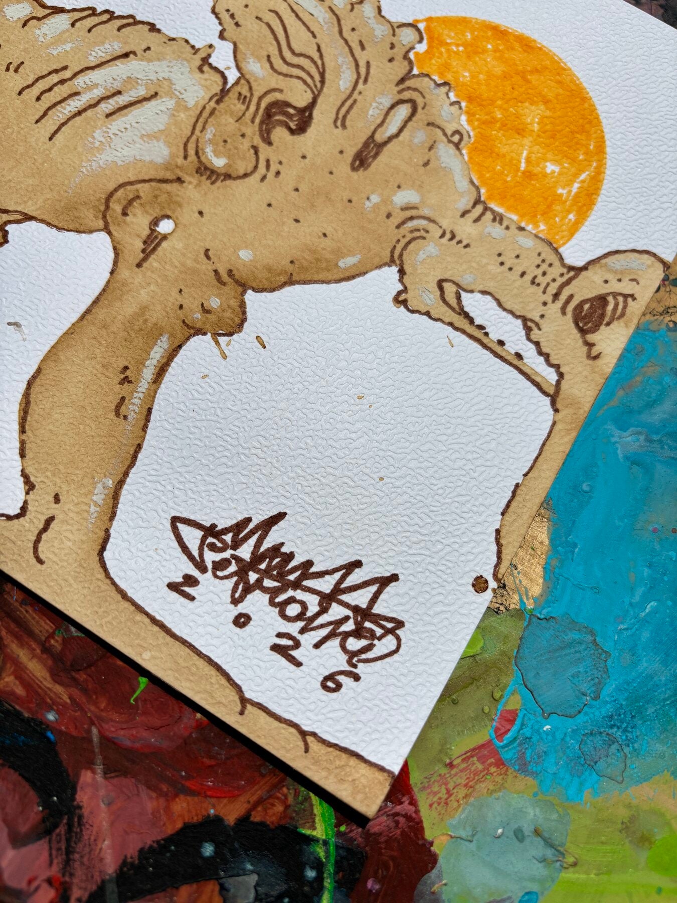 Dettaglio con firma del disegno al caffè Dumbo Sparamerda di Max Petrone