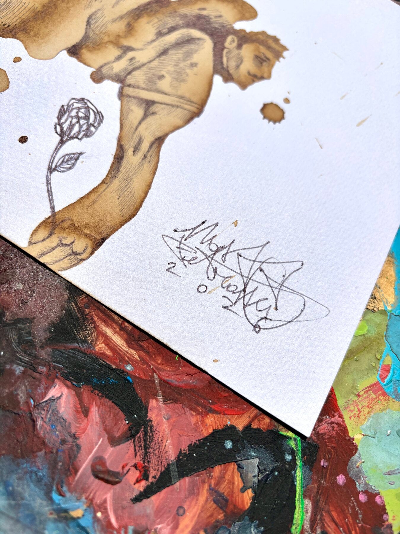 Dettaglio con firma del disegno al caffè Gobbo innamorato di Max Petrone
